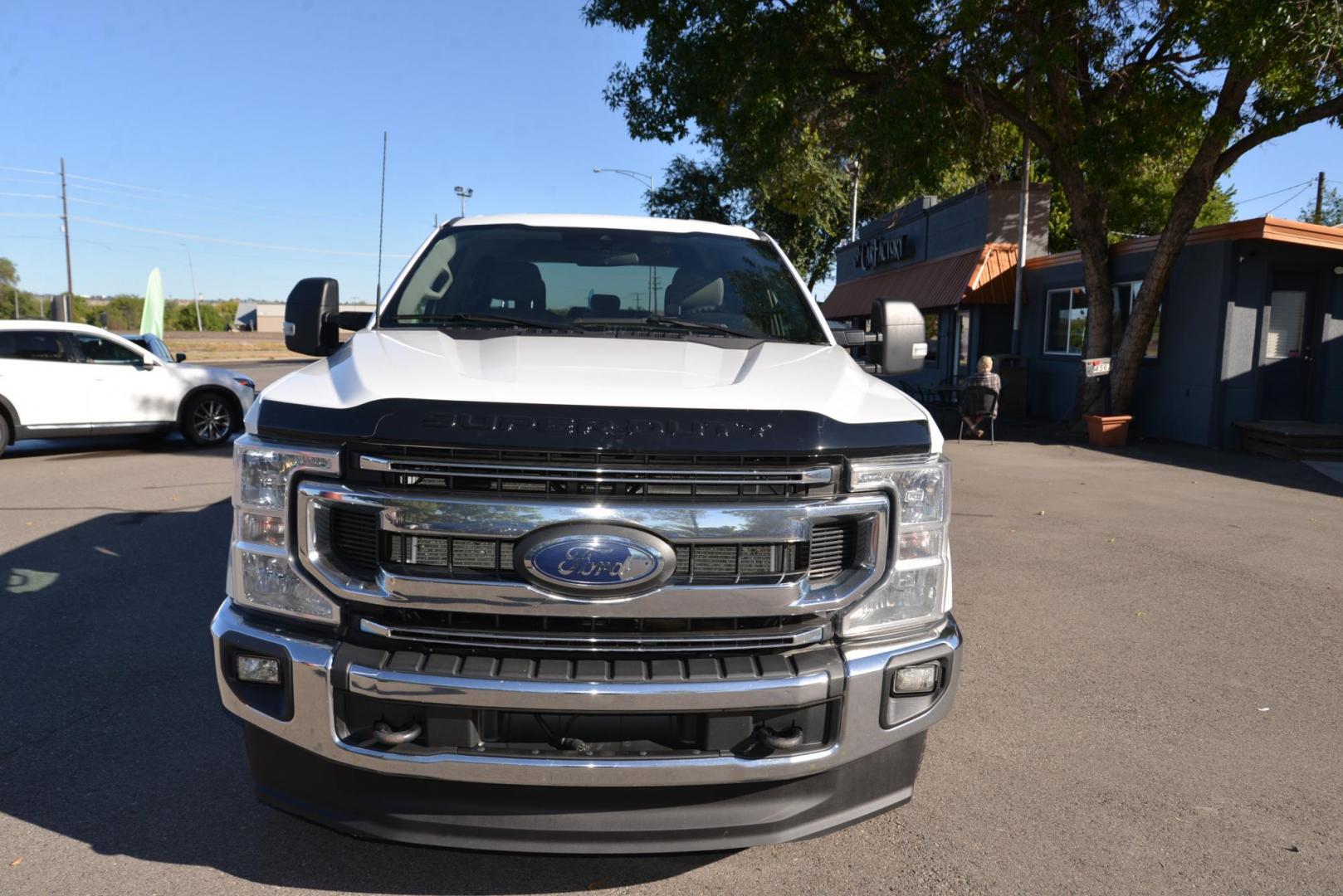 2021 Oxford White /Grey Ford F-350 SD XLT (1FT8W3BT4ME) with an 6.7L V8 OHV 16V DIESEL engine, 10 Speed Automatic transmission, located at 4562 State Avenue, Billings, MT, 59101, (406) 896-9833, 45.769516, -108.526772 - 2021 Ford F3 50 Super Duty Power Stroke Crew Cab 4x4 with an 8 foot bed it is a One Owner Diesel, there are no accidents recorded on the history report. The interior and exterior are very clean and the Ford runs and drives nicely. The tires are 18 inch Michelin LTX's and they are in next to new - Photo#7