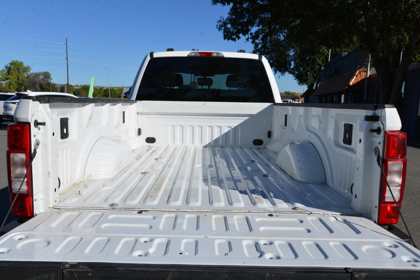 2021 Oxford White /Grey Ford F-350 SD XLT (1FT8W3BT4ME) with an 6.7L V8 OHV 16V DIESEL engine, 10 Speed Automatic transmission, located at 4562 State Avenue, Billings, MT, 59101, (406) 896-9833, 45.769516, -108.526772 - 2021 Ford F3 50 Super Duty Power Stroke Crew Cab 4x4 with an 8 foot bed it is a One Owner Diesel, there are no accidents recorded on the history report. The interior and exterior are very clean and the Ford runs and drives nicely. The tires are 18 inch Michelin LTX's and they are in next to new - Photo#8