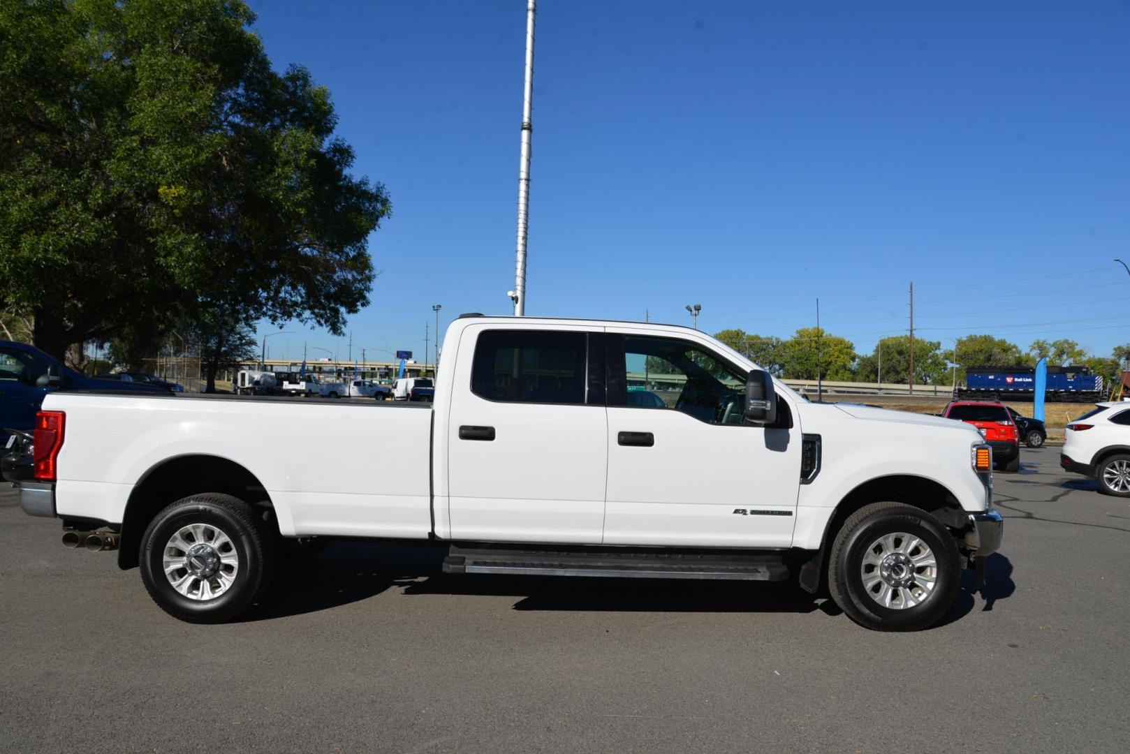 2021 Oxford White /Grey Ford F-350 SD XLT (1FT8W3BT4ME) with an 6.7L V8 OHV 16V DIESEL engine, 10 Speed Automatic transmission, located at 4562 State Avenue, Billings, MT, 59101, (406) 896-9833, 45.769516, -108.526772 - 2021 Ford F3 50 Super Duty Power Stroke Crew Cab 4x4 with an 8 foot bed it is a One Owner Diesel, there are no accidents recorded on the history report. The interior and exterior are very clean and the Ford runs and drives nicely. The tires are 18 inch Michelin LTX's and they are in next to new - Photo#10