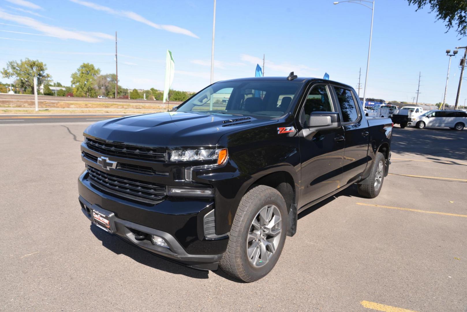 2022 Black /Jet Black Chevrolet Silverado 1500 Limited RST Crew Cab 4WD (1GCUYEEDXNZ) with an 5.3L V8 OHV 16V engine, 8 speed Automatic transmission, located at 4562 State Avenue, Billings, MT, 59101, (406) 896-9833, 45.769516, -108.526772 - 2022 Chevy 1500 Limited RST Crew Cab 4x4 It is a low mileage one owner truck and it still has remaining Factory Warranty, there are no accidents recorded on the history report. It runs and drives nicely, the interior and exterior are clean. The tires are 20 Inch Goodyear Wranglers and they are in - Photo#2