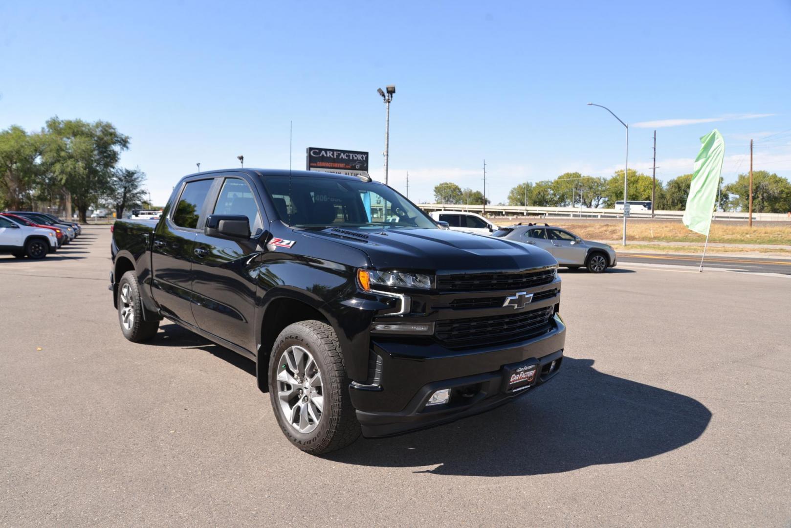 2022 Black /Jet Black Chevrolet Silverado 1500 Limited RST Crew Cab 4WD (1GCUYEEDXNZ) with an 5.3L V8 OHV 16V engine, 8 speed Automatic transmission, located at 4562 State Avenue, Billings, MT, 59101, (406) 896-9833, 45.769516, -108.526772 - 2022 Chevy 1500 Limited RST Crew Cab 4x4 It is a low mileage one owner truck and it still has remaining Factory Warranty, there are no accidents recorded on the history report. It runs and drives nicely, the interior and exterior are clean. The tires are 20 Inch Goodyear Wranglers and they are in - Photo#6