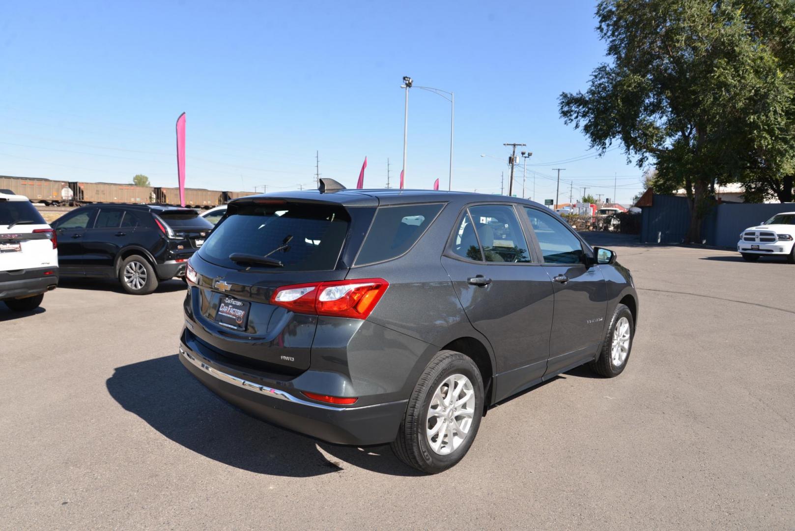 2021 NIGHTFALL GRAY METALLIC /MEDIUM ASH GRAY Chevrolet Equinox LS 1.5 AWD (2GNAXSEV9M6) with an 1.5L L4 DIR DOHC 16V TURBO engine, 6 speed automatic transmission, located at 4562 State Avenue, Billings, MT, 59101, (406) 896-9833, 45.769516, -108.526772 - 2021 Chevy Equinox All Wheel Drive LS It's a One Owner Cross Over with Remaining Factory Warranty, There are no accidents recorded on the history report. It runs and drives smooth and quiet. The interior and exterior are very clean. The tires are 17 Inch and they are in good shape. It has a 1.5 L - Photo#3