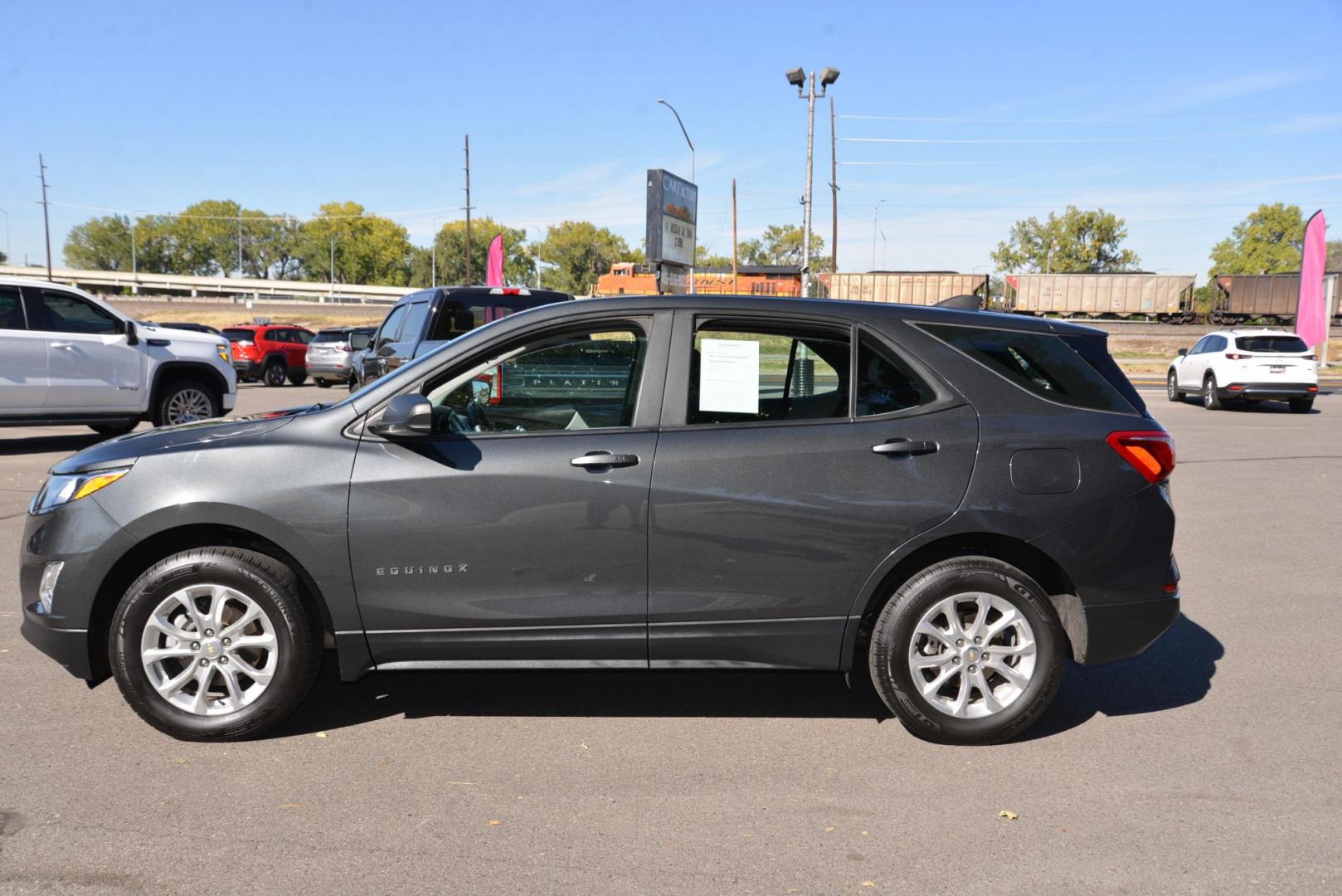 2021 NIGHTFALL GRAY METALLIC /MEDIUM ASH GRAY Chevrolet Equinox LS 1.5 AWD (2GNAXSEV9M6) with an 1.5L L4 DIR DOHC 16V TURBO engine, 6 speed automatic transmission, located at 4562 State Avenue, Billings, MT, 59101, (406) 896-9833, 45.769516, -108.526772 - 2021 Chevy Equinox All Wheel Drive LS It's a One Owner Cross Over with Remaining Factory Warranty, There are no accidents recorded on the history report. It runs and drives smooth and quiet. The interior and exterior are very clean. The tires are 17 Inch and they are in good shape. It has a 1.5 L - Photo#7