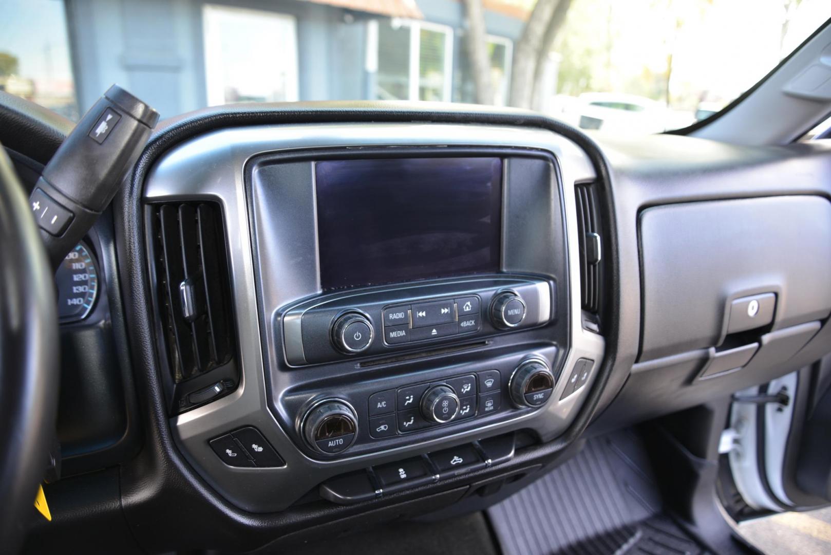 2017 Summit White /Jet Black Chevrolet Silverado 1500 LT Crew Cab 4WD (3GCUKREC1HG) with an 5.3L V8 OHV 16V engine, 6A transmission, located at 4562 State Avenue, Billings, MT, 59101, (406) 896-9833, 45.769516, -108.526772 - Photo#17