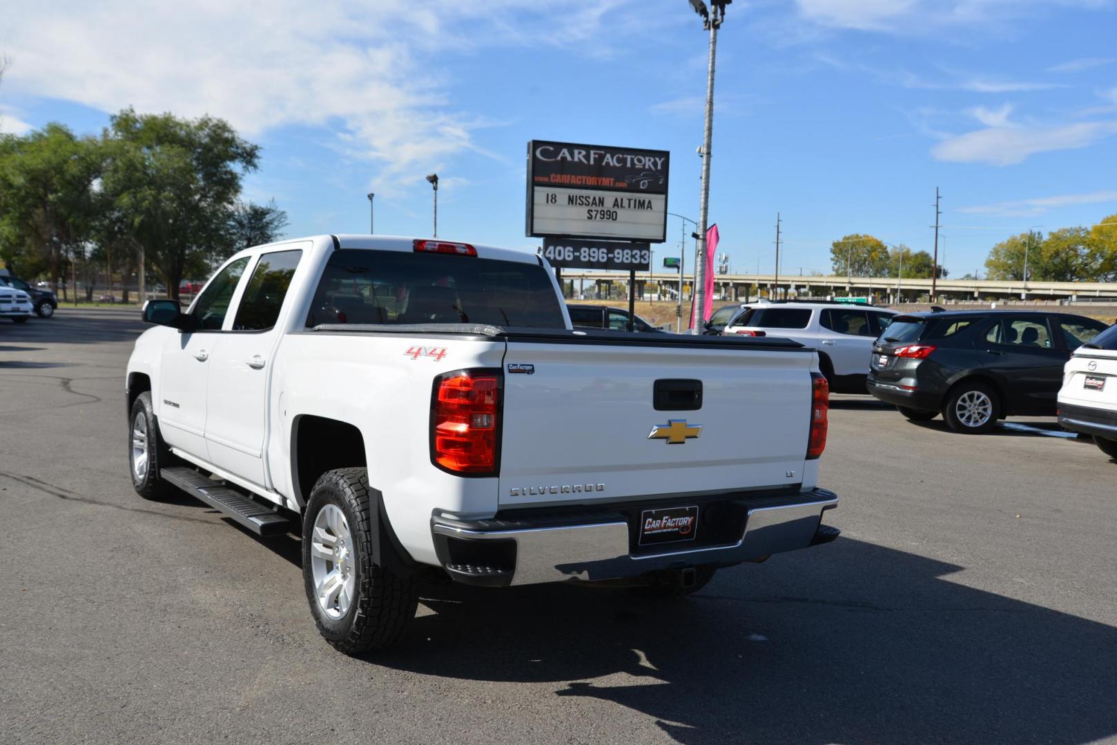 2017 Summit White /Jet Black Chevrolet Silverado 1500 LT Crew Cab 4WD (3GCUKREC1HG) with an 5.3L V8 OHV 16V engine, 6A transmission, located at 4562 State Avenue, Billings, MT, 59101, (406) 896-9833, 45.769516, -108.526772 - Photo#4