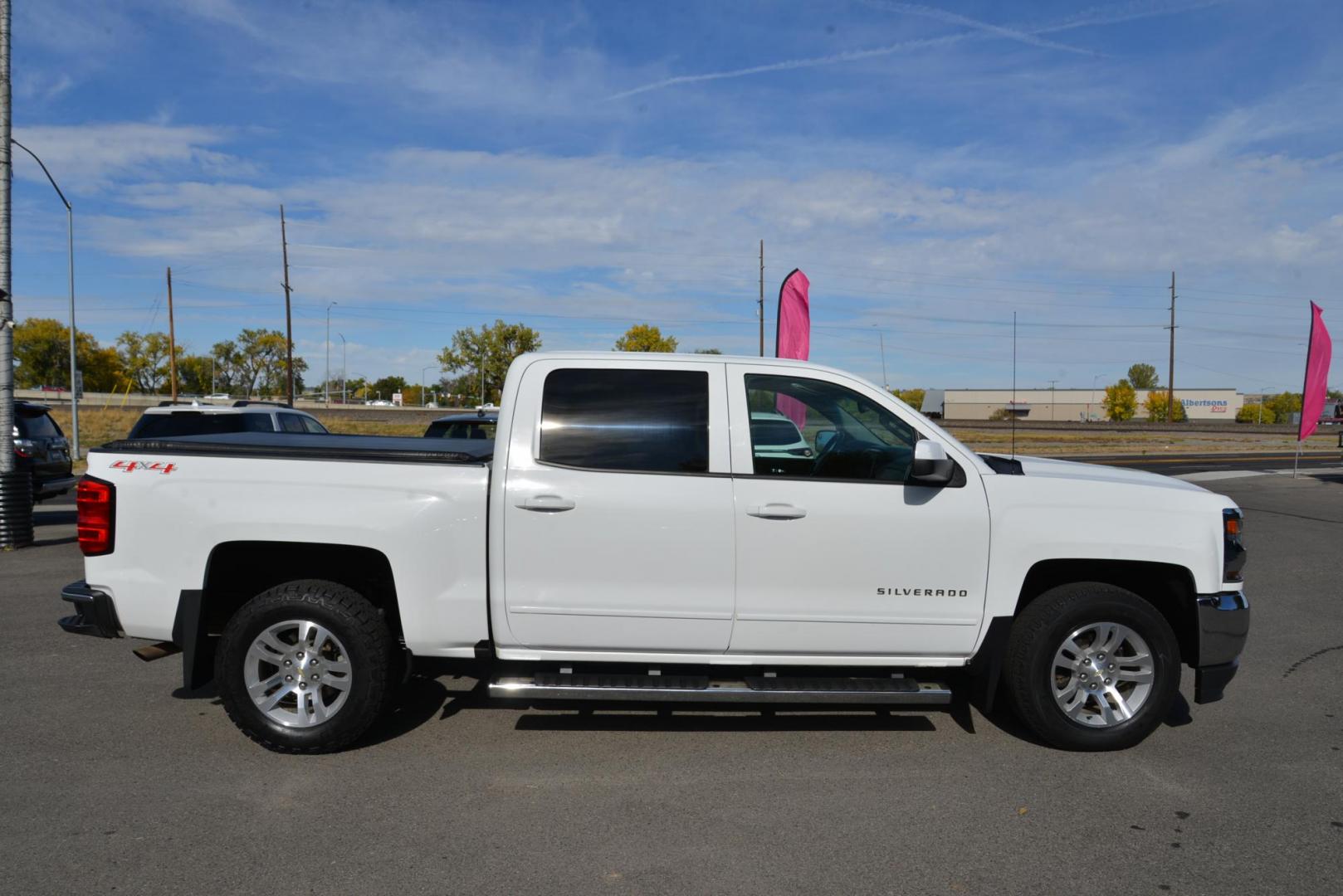 2017 Summit White /Jet Black Chevrolet Silverado 1500 LT Crew Cab 4WD (3GCUKREC1HG) with an 5.3L V8 OHV 16V engine, 6A transmission, located at 4562 State Avenue, Billings, MT, 59101, (406) 896-9833, 45.769516, -108.526772 - Photo#7