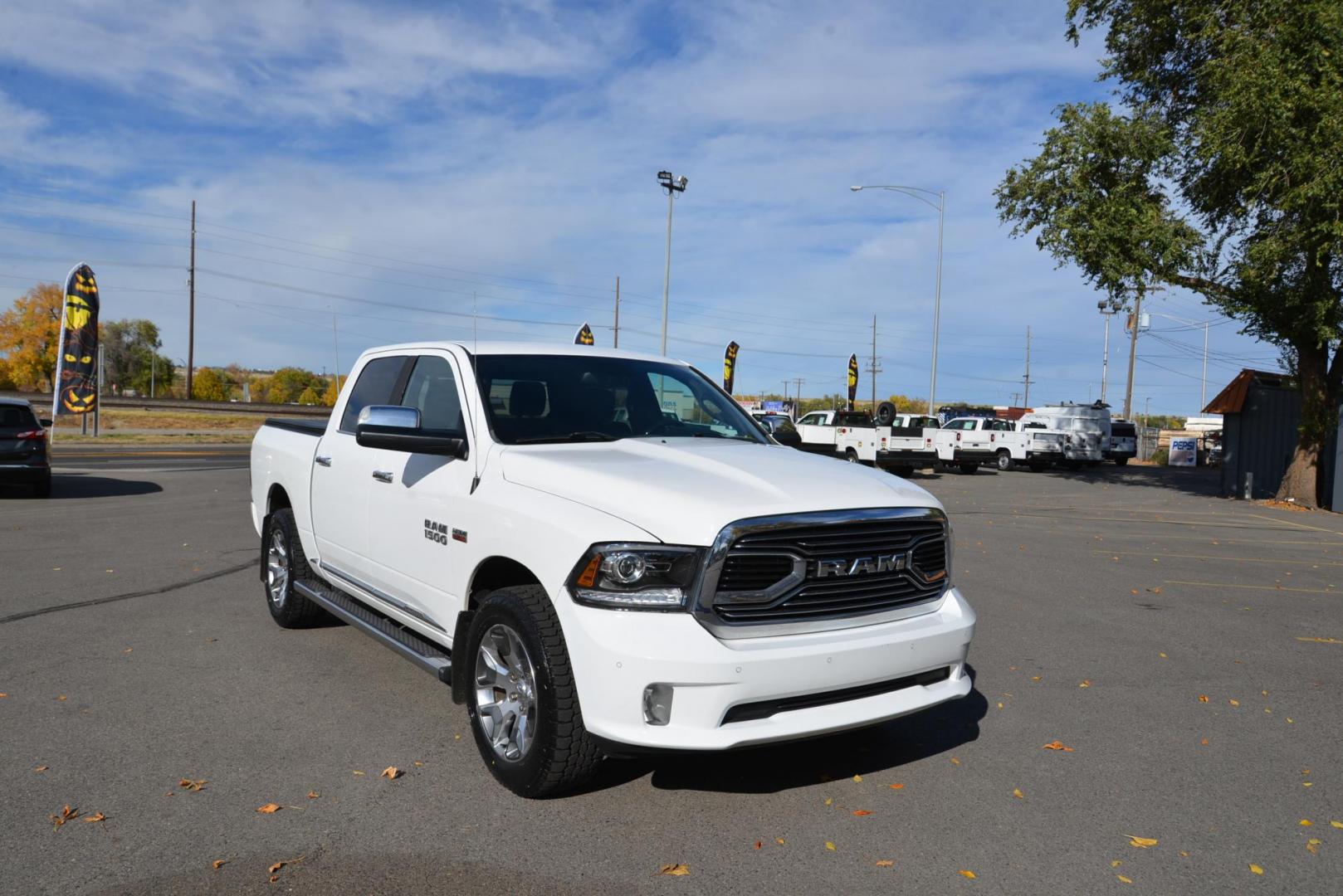 2017 Bright White /Black RAM 1500 Limited laramie (1C6RR7PT5HS) with an 5.7L V8 OHV 16V engine, 8 speed Automatic transmission, located at 4562 State Avenue, Billings, MT, 59101, (406) 896-9833, 45.769516, -108.526772 - 2017 Ram 1500 Laramie Limited Crew Cab 4x4 The Ram is a Low Mileage Truck, The interior and exterior are clean, it runs and drives nicely, The Bed Size is 5 Foot 7 inches, The 20 Inch tires are Sumitomo Encounters and they are brand new It has a 5.7 Liter Hemi V8, 8 Speed Automatic Transmissio - Photo#2