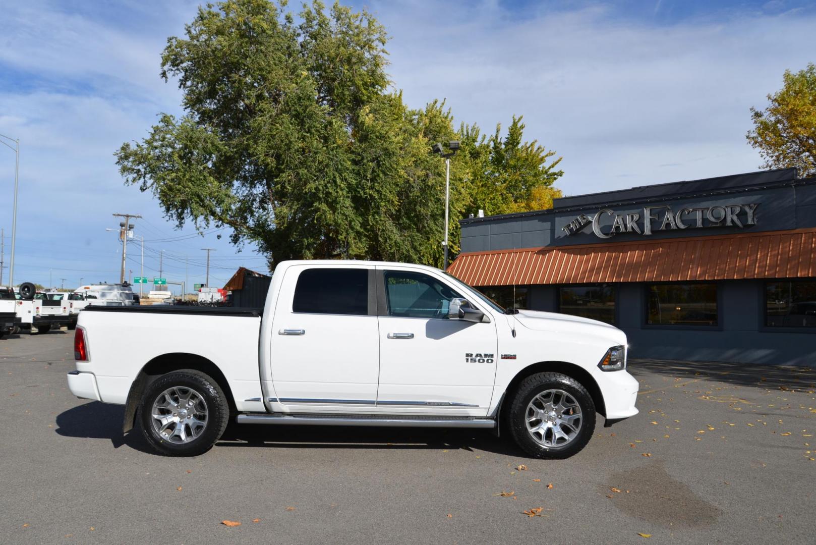 2017 Bright White /Black RAM 1500 Limited laramie (1C6RR7PT5HS) with an 5.7L V8 OHV 16V engine, 8 speed Automatic transmission, located at 4562 State Avenue, Billings, MT, 59101, (406) 896-9833, 45.769516, -108.526772 - 2017 Ram 1500 Laramie Limited Crew Cab 4x4 The Ram is a Low Mileage Truck, The interior and exterior are clean, it runs and drives nicely, The Bed Size is 5 Foot 7 inches, The 20 Inch tires are Sumitomo Encounters and they are brand new It has a 5.7 Liter Hemi V8, 8 Speed Automatic Transmissio - Photo#3