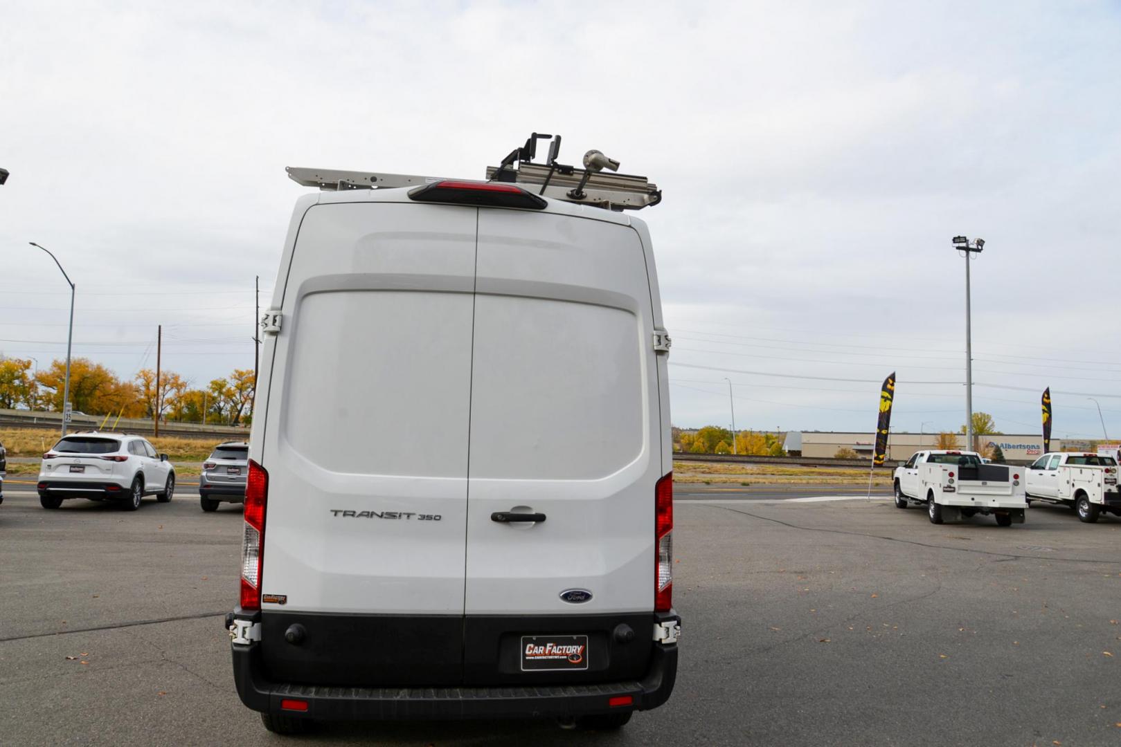 2019 Oxford White /Grey Ford Transit 350 Van High Roof w/Dual Sliding Pass. 148-in. WB (1FTBW2UM4KK) with an 3.7L V6 DOHC 24V engine, 6A transmission, located at 4562 State Avenue, Billings, MT, 59101, (406) 896-9833, 45.769516, -108.526772 - 2000 19 Ford Transit, T-350 High Roof Cargo Van This Low Mileage one Ton Cargo Van has no accidents recorded on the history report, The tires are in good shape. It has been inspected, serviced and it's ready to go to the job site today it has a 3.7 liter V6 Engine, 6 speed automatic transmissi - Photo#5