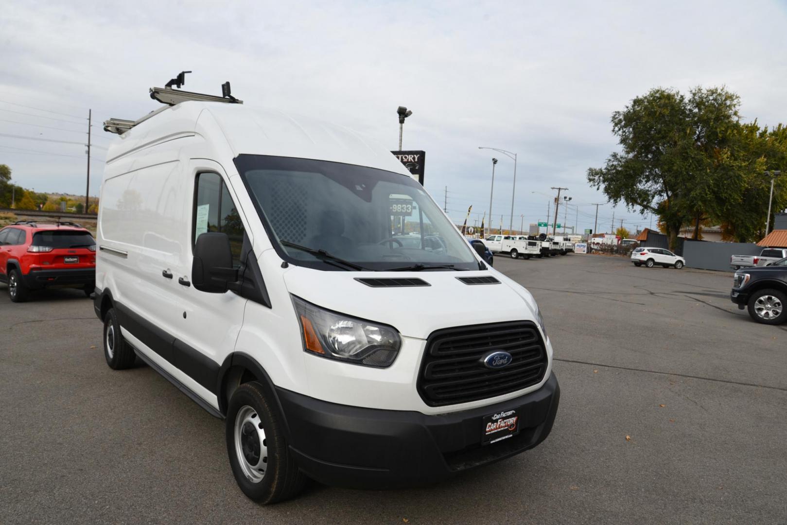 2019 Oxford White /Grey Ford Transit 350 Van High Roof w/Dual Sliding Pass. 148-in. WB (1FTBW2UM4KK) with an 3.7L V6 DOHC 24V engine, 6A transmission, located at 4562 State Avenue, Billings, MT, 59101, (406) 896-9833, 45.769516, -108.526772 - 2000 19 Ford Transit, T-350 High Roof Cargo Van This Low Mileage one Ton Cargo Van has no accidents recorded on the history report, The tires are in good shape. It has been inspected, serviced and it's ready to go to the job site today it has a 3.7 liter V6 Engine, 6 speed automatic transmissi - Photo#6