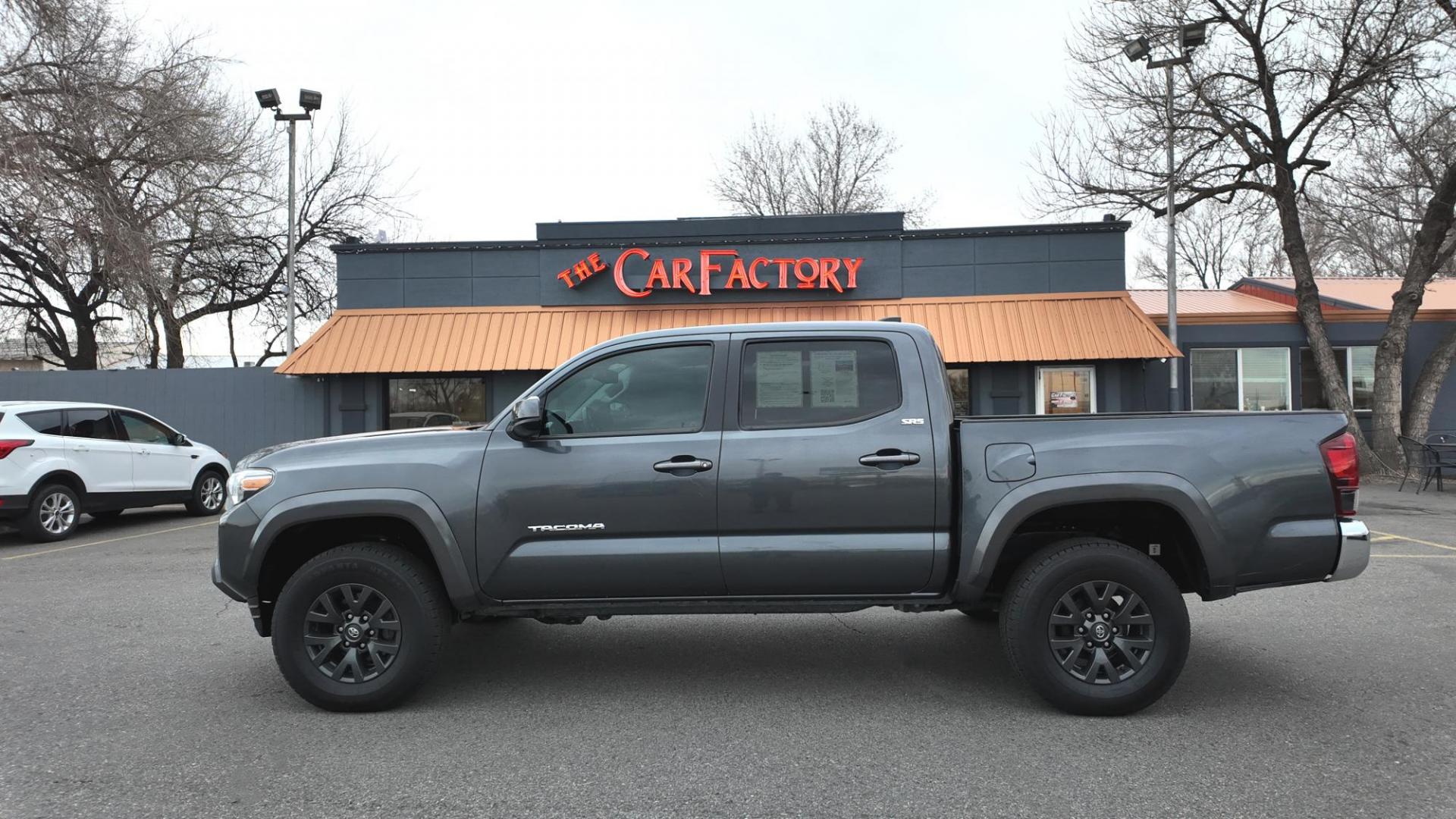 2022 Magnetic Gray Metallic /Black with red accents Toyota Tacoma SR5 Double Cab Long Bed V6 6AT 4WD (3TMCZ5ANXNM) with an 3.5L V6 DOHC 24V engine, 6A transmission, located at 4562 State Avenue, Billings, MT, 59101, (406) 896-9833, 45.769516, -108.526772 - 2022 Toyota Tacoma, SR5 Double Cab 4x4 The Tacoma is a One Owner Truck, There are no accidents recorded on the history report. The Interior and exterior are very clean. It runs and drives nicely. The 16 Inch Tires are in good condition It has the tried and true, reliable Atkinson Cycle V6 Engi - Photo#2