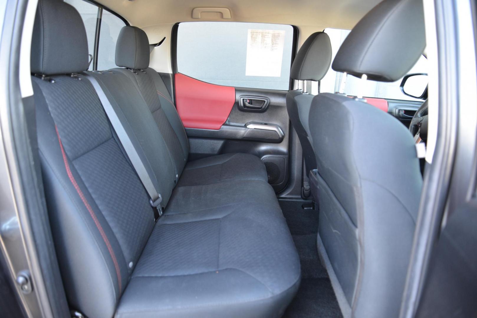 2022 Magnetic Gray Metallic /Black with red accents Toyota Tacoma SR5 Double Cab Long Bed V6 6AT 4WD (3TMCZ5ANXNM) with an 3.5L V6 DOHC 24V engine, 6A transmission, located at 4562 State Avenue, Billings, MT, 59101, (406) 896-9833, 45.769516, -108.526772 - 2022 Toyota Tacoma, SR5 Double Cab 4x4 The Tacoma is a One Owner Truck, There are no accidents recorded on the history report. The Interior and exterior are very clean. It runs and drives nicely. The 16 Inch Tires are in good condition It has the tried and true, reliable Atkinson Cycle V6 Engi - Photo#28