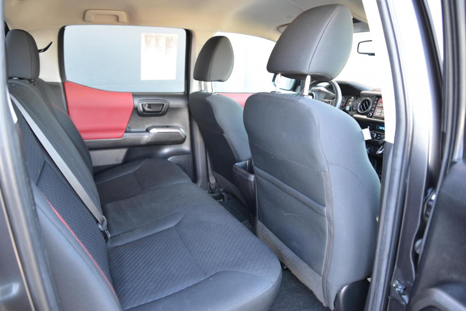 2022 Magnetic Gray Metallic /Black with red accents Toyota Tacoma SR5 Double Cab Long Bed V6 6AT 4WD (3TMCZ5ANXNM) with an 3.5L V6 DOHC 24V engine, 6A transmission, located at 4562 State Avenue, Billings, MT, 59101, (406) 896-9833, 45.769516, -108.526772 - 2022 Toyota Tacoma, SR5 Double Cab 4x4 The Tacoma is a One Owner Truck, There are no accidents recorded on the history report. The Interior and exterior are very clean. It runs and drives nicely. The 16 Inch Tires are in good condition It has the tried and true, reliable Atkinson Cycle V6 Engi - Photo#29