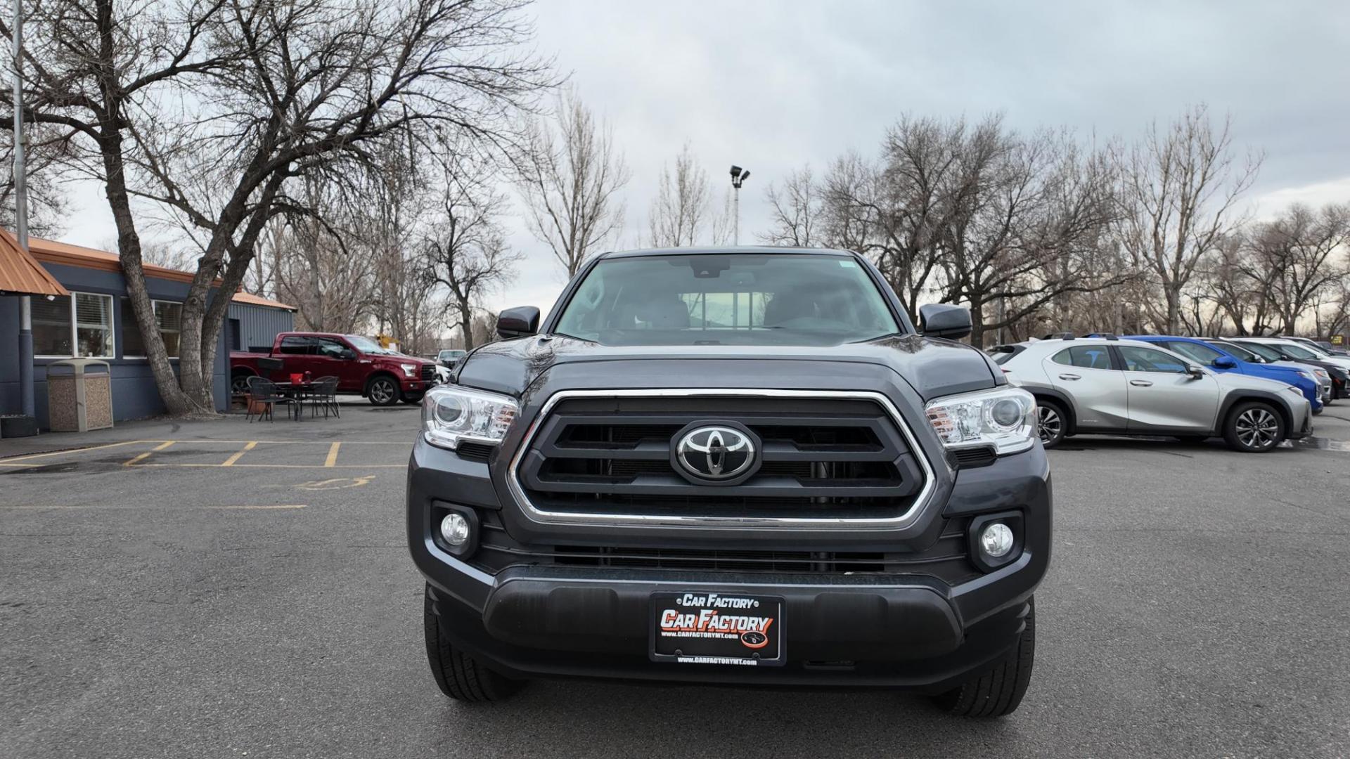 2022 Magnetic Gray Metallic /Black with red accents Toyota Tacoma SR5 Double Cab Long Bed V6 6AT 4WD (3TMCZ5ANXNM) with an 3.5L V6 DOHC 24V engine, 6A transmission, located at 4562 State Avenue, Billings, MT, 59101, (406) 896-9833, 45.769516, -108.526772 - 2022 Toyota Tacoma, SR5 Double Cab 4x4 The Tacoma is a One Owner Truck, There are no accidents recorded on the history report. The Interior and exterior are very clean. It runs and drives nicely. The 16 Inch Tires are in good condition It has the tried and true, reliable Atkinson Cycle V6 Engi - Photo#4