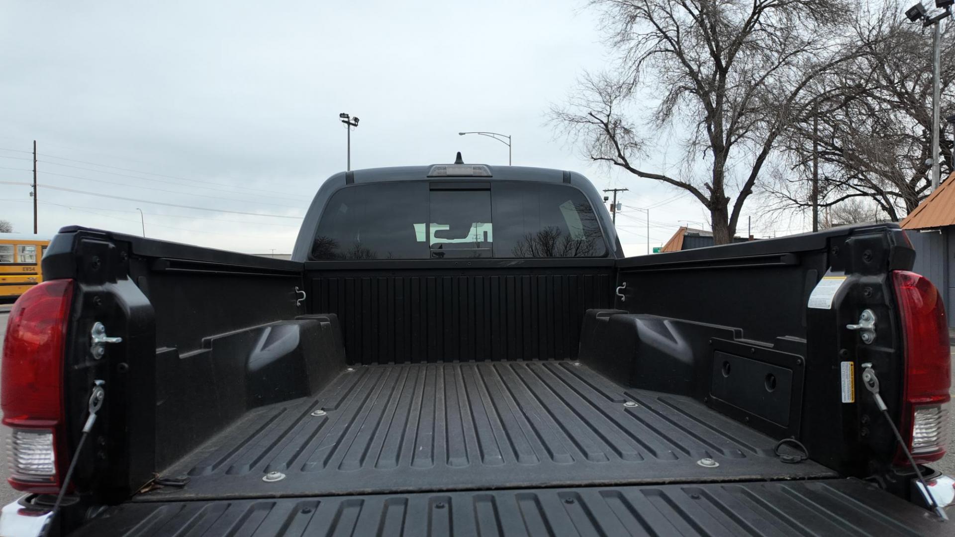 2022 Magnetic Gray Metallic /Black with red accents Toyota Tacoma SR5 Double Cab Long Bed V6 6AT 4WD (3TMCZ5ANXNM) with an 3.5L V6 DOHC 24V engine, 6A transmission, located at 4562 State Avenue, Billings, MT, 59101, (406) 896-9833, 45.769516, -108.526772 - 2022 Toyota Tacoma, SR5 Double Cab 4x4 The Tacoma is a One Owner Truck, There are no accidents recorded on the history report. The Interior and exterior are very clean. It runs and drives nicely. The 16 Inch Tires are in good condition It has the tried and true, reliable Atkinson Cycle V6 Engi - Photo#7