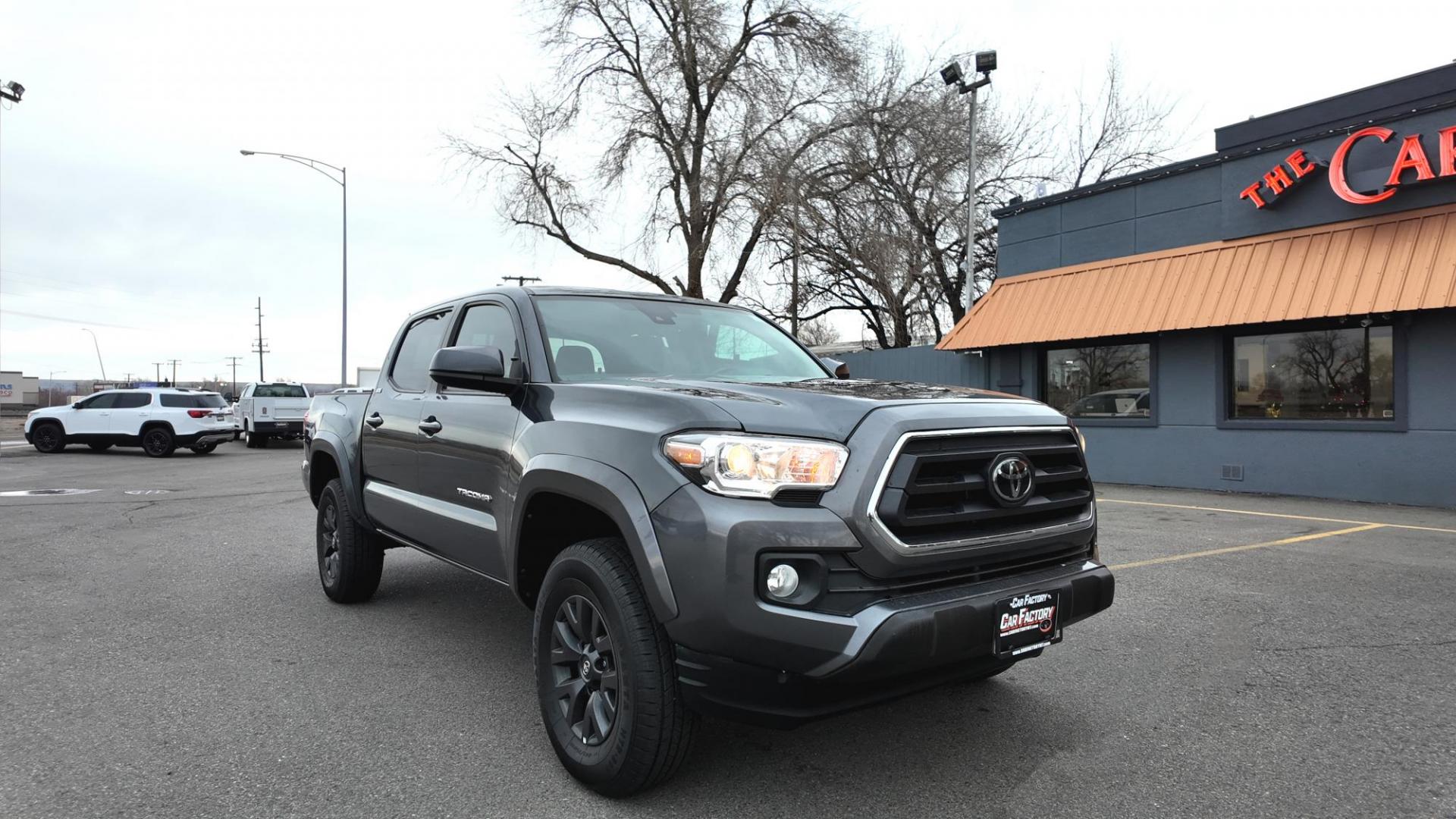 2022 Magnetic Gray Metallic /Black with red accents Toyota Tacoma SR5 Double Cab Long Bed V6 6AT 4WD (3TMCZ5ANXNM) with an 3.5L V6 DOHC 24V engine, 6A transmission, located at 4562 State Avenue, Billings, MT, 59101, (406) 896-9833, 45.769516, -108.526772 - 2022 Toyota Tacoma, SR5 Double Cab 4x4 The Tacoma is a One Owner Truck, There are no accidents recorded on the history report. The Interior and exterior are very clean. It runs and drives nicely. The 16 Inch Tires are in good condition It has the tried and true, reliable Atkinson Cycle V6 Engi - Photo#8