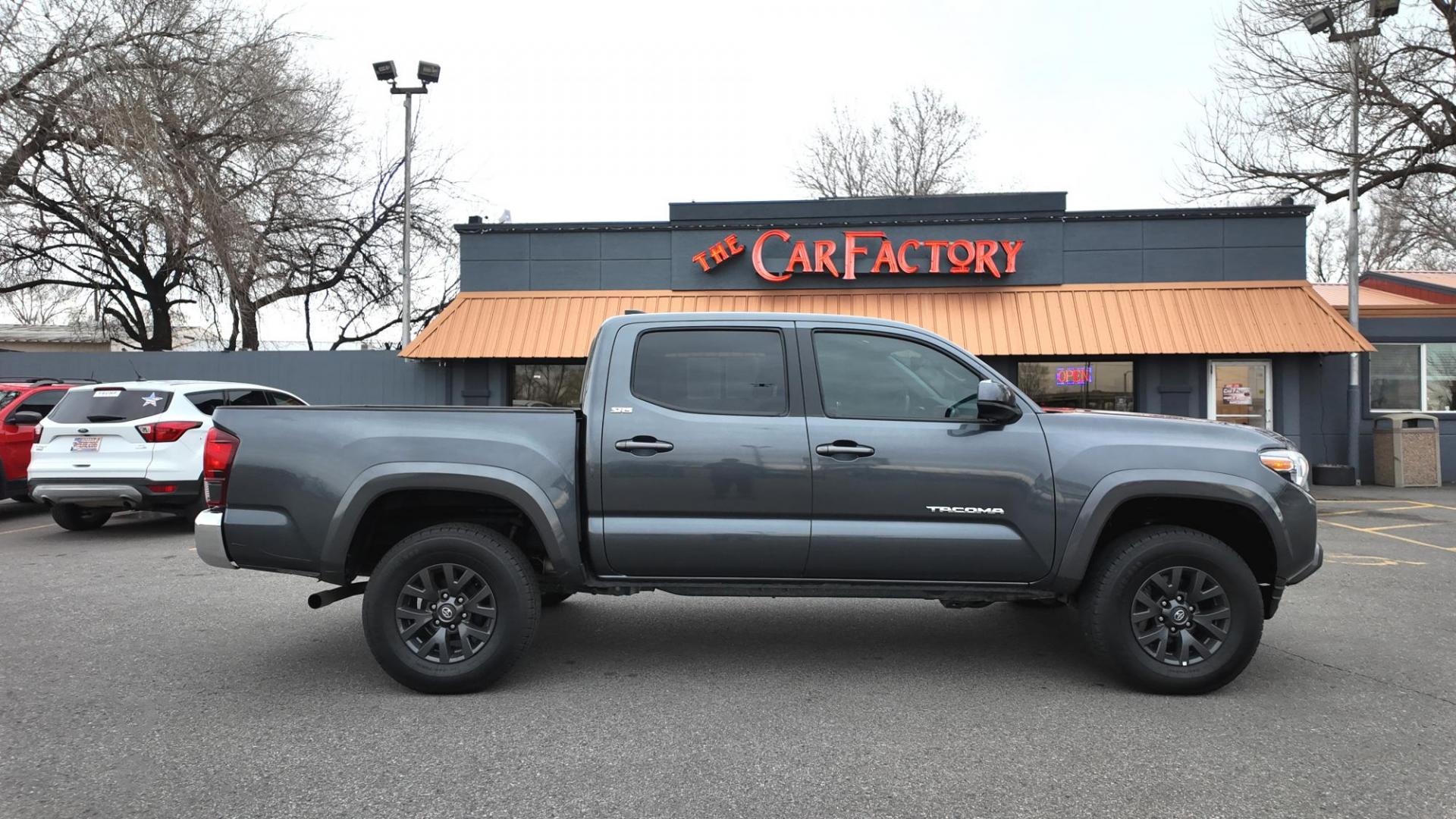 2022 Magnetic Gray Metallic /Black with red accents Toyota Tacoma SR5 Double Cab Long Bed V6 6AT 4WD (3TMCZ5ANXNM) with an 3.5L V6 DOHC 24V engine, 6A transmission, located at 4562 State Avenue, Billings, MT, 59101, (406) 896-9833, 45.769516, -108.526772 - 2022 Toyota Tacoma, SR5 Double Cab 4x4 The Tacoma is a One Owner Truck, There are no accidents recorded on the history report. The Interior and exterior are very clean. It runs and drives nicely. The 16 Inch Tires are in good condition It has the tried and true, reliable Atkinson Cycle V6 Engi - Photo#9