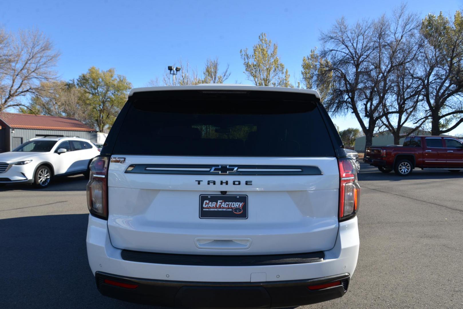 2021 IRIDESCENT PEARL TRICOAT /Dark Atmosphere Chevrolet Tahoe Z71 (1GNSKPKD6MR) with an 5.3L V8 OHV 16V engine, 10 Speed Automatic transmission, located at 4562 State Avenue, Billings, MT, 59101, (406) 896-9833, 45.769516, -108.526772 - 2021 Chevy Tahoe Z71 4x4 The Tahoe runs and drives smooth and quiet. There are no accidents recorded on the history report. The Exterior and interior are clean. The Tires are 20 Inch cooper discoverers and they are in good shape. This Chevy has a 5.3 Liter V8 Engine, 10 Speed Automatic Transmissio - Photo#6