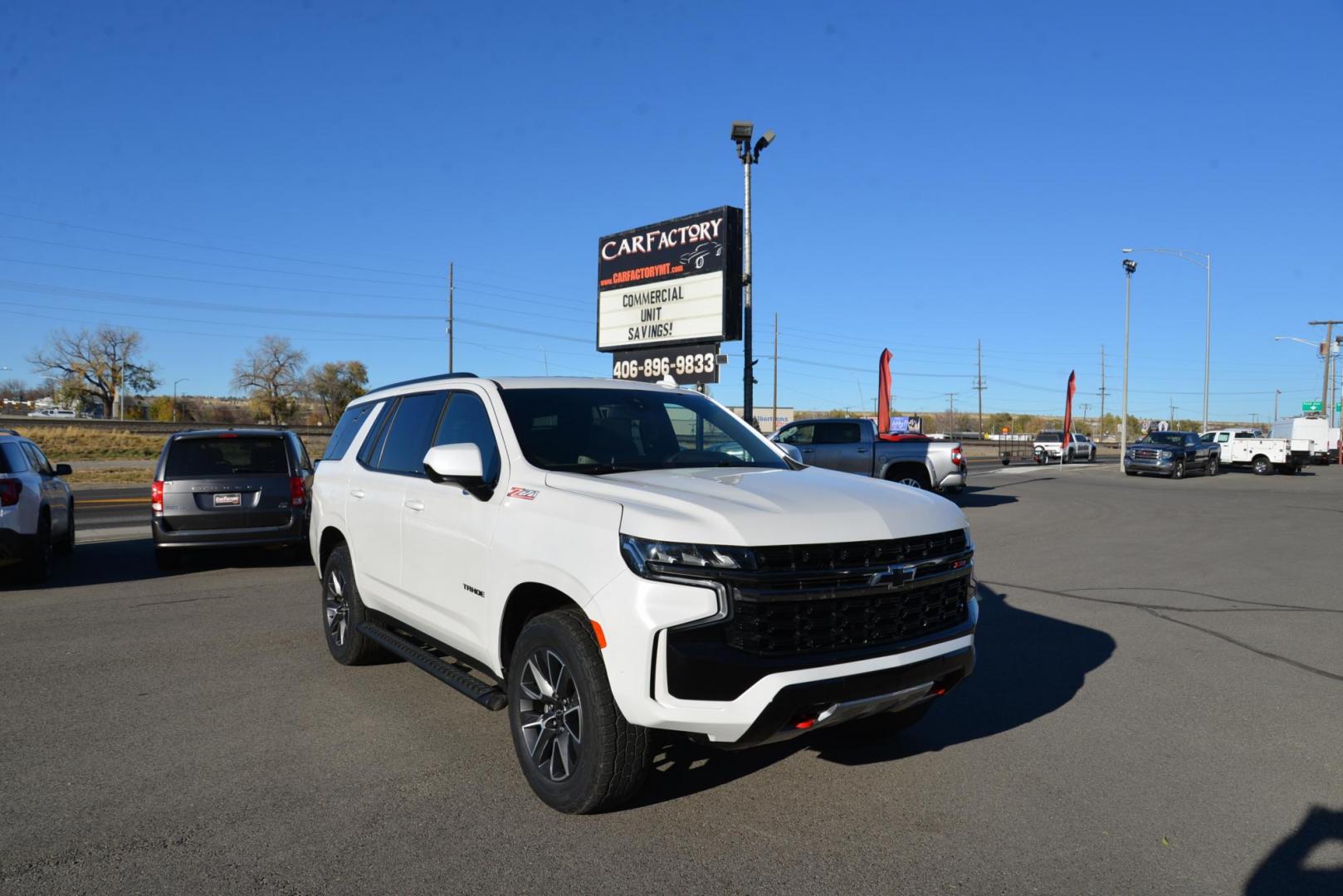 2021 IRIDESCENT PEARL TRICOAT /Dark Atmosphere Chevrolet Tahoe Z71 (1GNSKPKD6MR) with an 5.3L V8 OHV 16V engine, 10 Speed Automatic transmission, located at 4562 State Avenue, Billings, MT, 59101, (406) 896-9833, 45.769516, -108.526772 - 2021 Chevy Tahoe Z71 4x4 The Tahoe runs and drives smooth and quiet. There are no accidents recorded on the history report. The Exterior and interior are clean. The Tires are 20 Inch cooper discoverers and they are in good shape. This Chevy has a 5.3 Liter V8 Engine, 10 Speed Automatic Transmissio - Photo#9