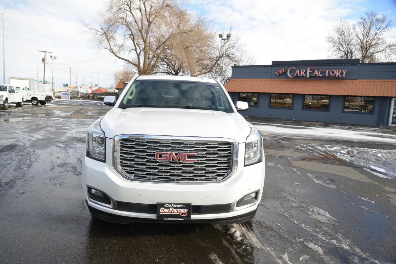 2018 White /Cocoa/Dark Atmosphere GMC Yukon Denali 4WD (1GKS2CKJ3JR) with an 6.2L V8 OHV 16V engine, 10 Speed Automatic transmission, located at 4562 State Avenue, Billings, MT, 59101, (406) 896-9833, 45.769516, -108.526772 - 2018 GMC Yukon Denali 4x4 with 3rd row seating The Yukon is a 2 Owner vehicle, There are no accidents recorded on the vehicle history report, it runs and drives smooth and quiet. The Interior and Exterior are both very clean. The Tires are new 20 inch Hercules Terra Trac It has a 6.2 Liter V - Photo#4