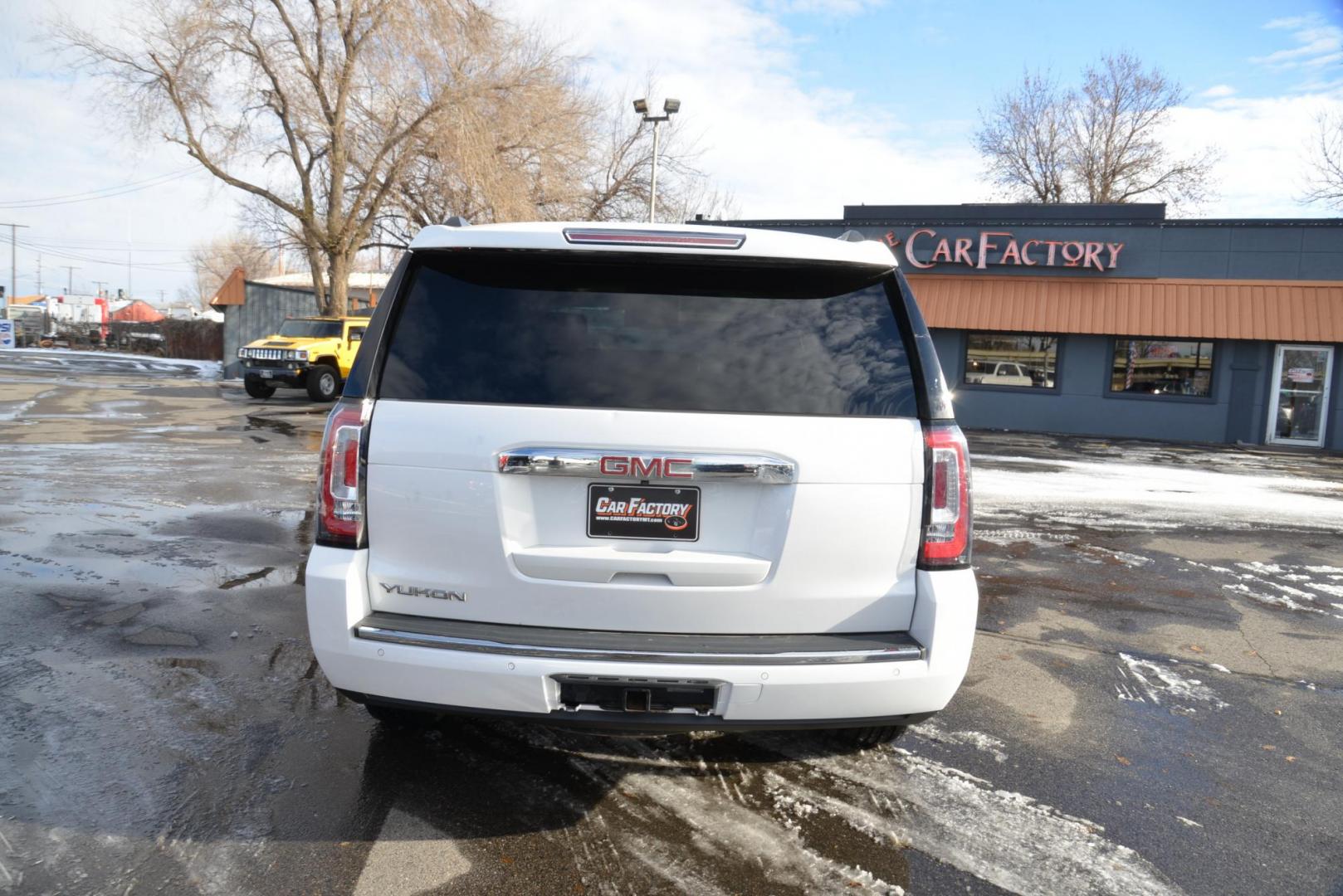 2018 White /Cocoa/Dark Atmosphere GMC Yukon Denali 4WD (1GKS2CKJ3JR) with an 6.2L V8 OHV 16V engine, 10 Speed Automatic transmission, located at 4562 State Avenue, Billings, MT, 59101, (406) 896-9833, 45.769516, -108.526772 - 2018 GMC Yukon Denali 4x4 with 3rd row seating The Yukon is a 2 Owner vehicle, There are no accidents recorded on the vehicle history report, it runs and drives smooth and quiet. The Interior and Exterior are both very clean. The Tires are new 20 inch Hercules Terra Trac It has a 6.2 Liter V - Photo#6