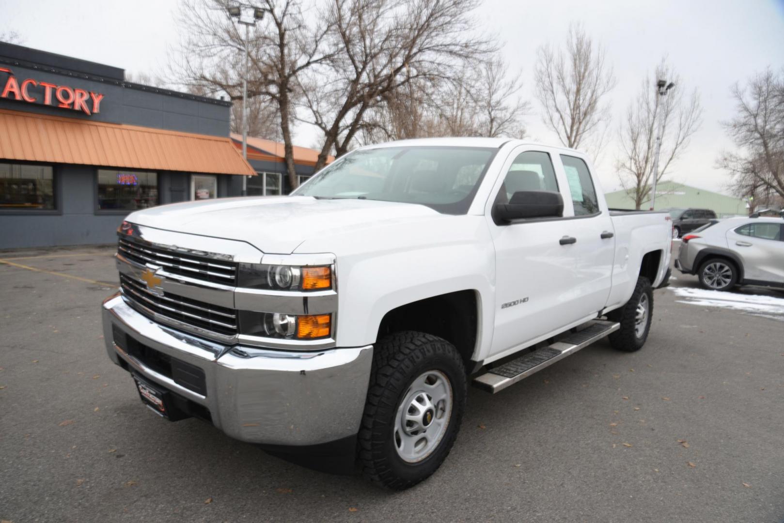 2016 Summit White /Grey Chevrolet Silverado 2500HD Work Truck Double Cab 4WD (1GC2KUEG3GZ) with an 6.0L V8 OHV 16V FFV engine, 6-Speed Heavy Duty Automatic transmission, located at 4562 State Avenue, Billings, MT, 59101, (406) 896-9833, 45.769516, -108.526772 - 2016 Chevy Silverado 2500 HD 4x4 This Low Mileage Chevy is a One owner truck. There are no accidents recorded on the history report . The Silverado runs and drives nicely.. The 17 Inch Good Year Wrangler Tires are in decent shape. It has a 6.0 Liter V8 , 6 Speed Automatic Transmission, 4.10 Rear - Photo#2