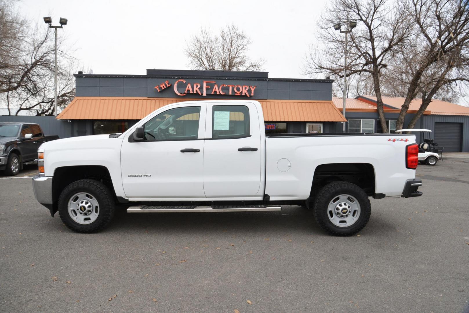 2016 Summit White /Grey Chevrolet Silverado 2500HD Work Truck Double Cab 4WD (1GC2KUEG3GZ) with an 6.0L V8 OHV 16V FFV engine, 6-Speed Heavy Duty Automatic transmission, located at 4562 State Avenue, Billings, MT, 59101, (406) 896-9833, 45.769516, -108.526772 - 2016 Chevy Silverado 2500 HD 4x4 This Low Mileage Chevy is a One owner truck. There are no accidents recorded on the history report . The Silverado runs and drives nicely.. The 17 Inch Good Year Wrangler Tires are in decent shape. It has a 6.0 Liter V8 , 6 Speed Automatic Transmission, 4.10 Rear - Photo#4