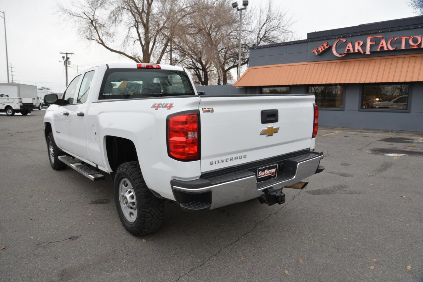 2016 Summit White /Grey Chevrolet Silverado 2500HD Work Truck Double Cab 4WD (1GC2KUEG3GZ) with an 6.0L V8 OHV 16V FFV engine, 6-Speed Heavy Duty Automatic transmission, located at 4562 State Avenue, Billings, MT, 59101, (406) 896-9833, 45.769516, -108.526772 - 2016 Chevy Silverado 2500 HD 4x4 This Low Mileage Chevy is a One owner truck. There are no accidents recorded on the history report . The Silverado runs and drives nicely.. The 17 Inch Good Year Wrangler Tires are in decent shape. It has a 6.0 Liter V8 , 6 Speed Automatic Transmission, 4.10 Rear - Photo#5