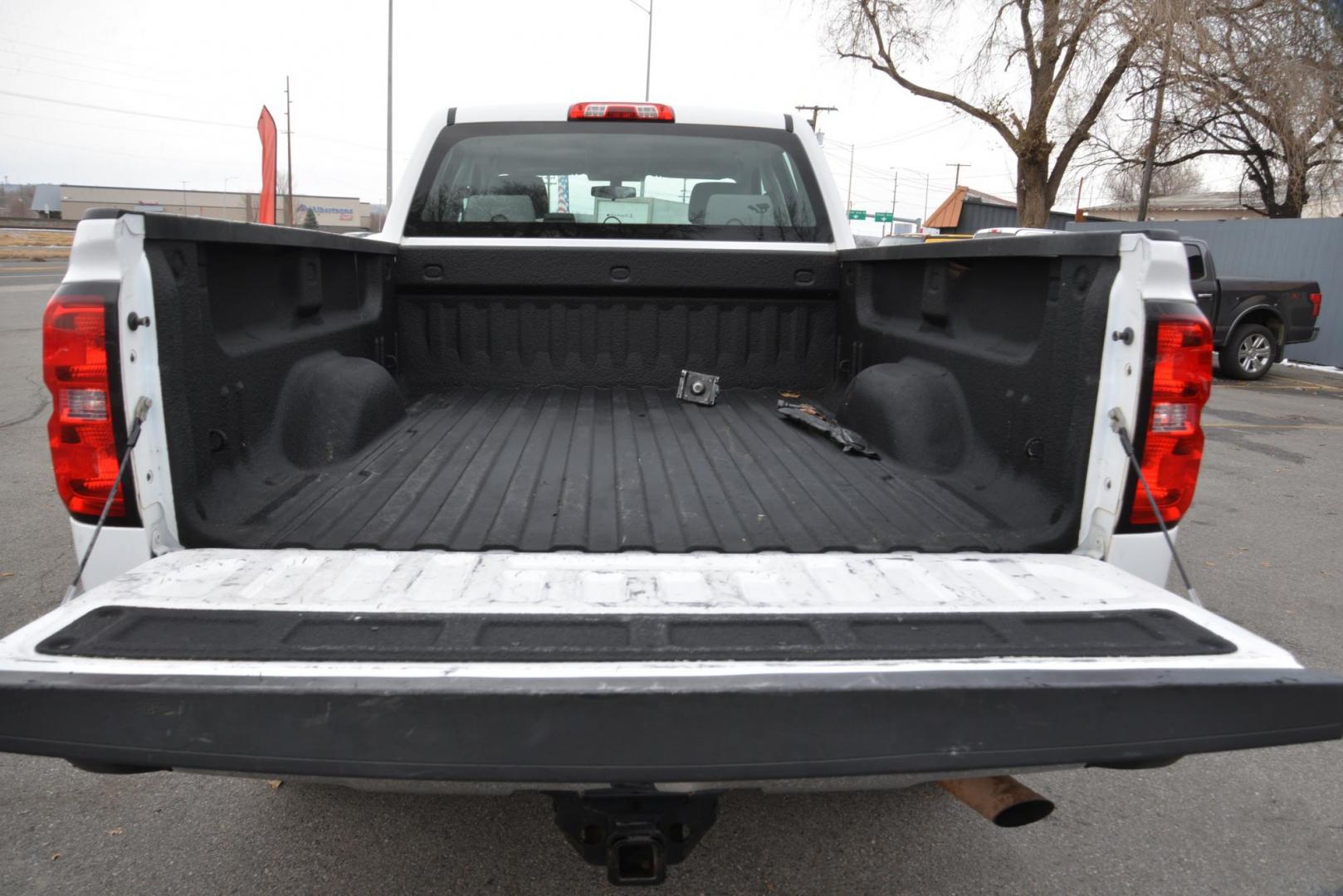 2016 Summit White /Grey Chevrolet Silverado 2500HD Work Truck Double Cab 4WD (1GC2KUEG3GZ) with an 6.0L V8 OHV 16V FFV engine, 6-Speed Heavy Duty Automatic transmission, located at 4562 State Avenue, Billings, MT, 59101, (406) 896-9833, 45.769516, -108.526772 - 2016 Chevy Silverado 2500 HD 4x4 This Low Mileage Chevy is a One owner truck. There are no accidents recorded on the history report . The Silverado runs and drives nicely.. The 17 Inch Good Year Wrangler Tires are in decent shape. It has a 6.0 Liter V8 , 6 Speed Automatic Transmission, 4.10 Rear - Photo#7