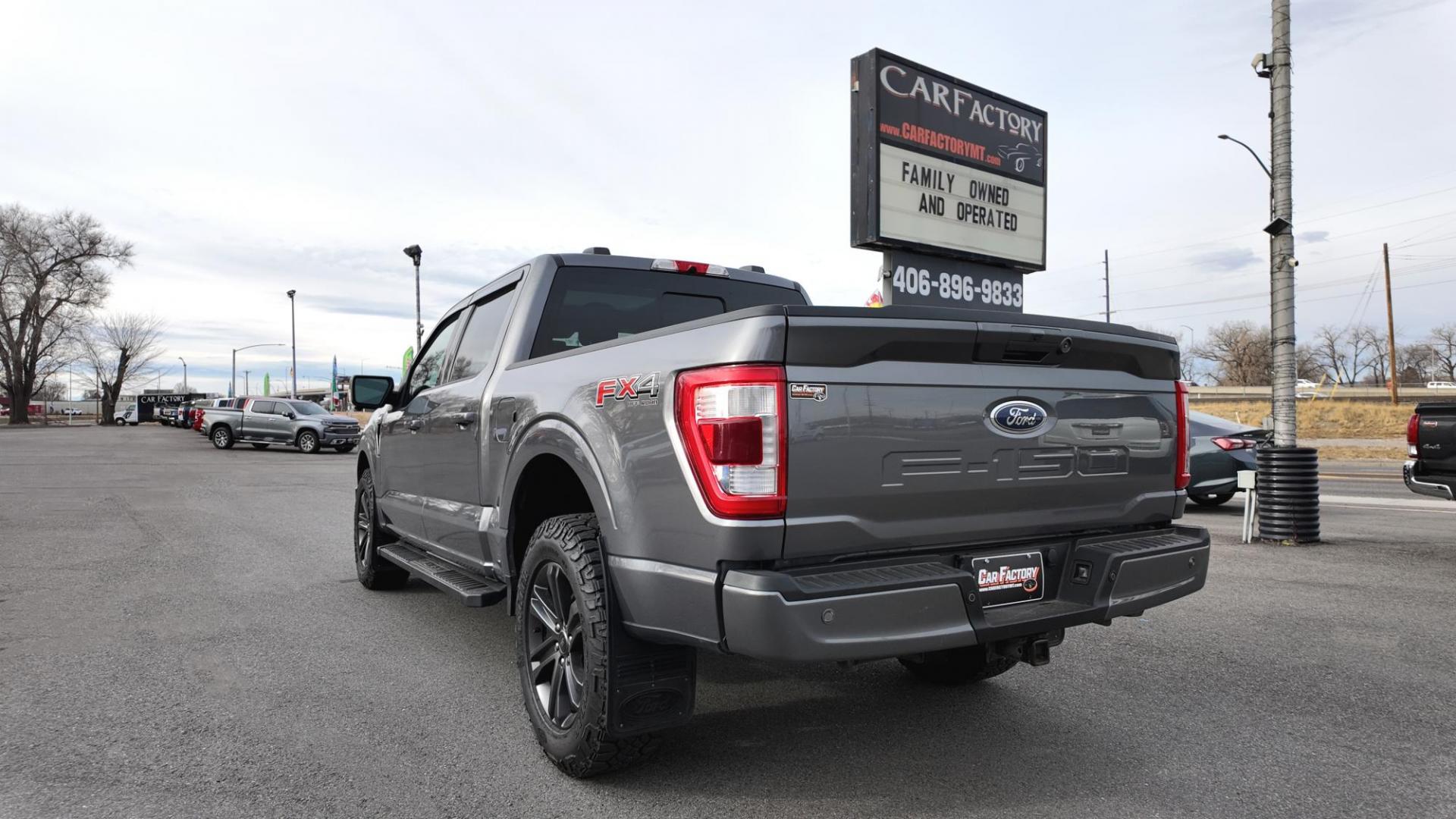 2021 Grey /Black Ford F-150 (1FTFW1E53MF) with an 5.0L V8 OHV 16V engine, 6A transmission, located at 4562 State Avenue, Billings, MT, 59101, (406) 896-9833, 45.769516, -108.526772 - This is a 2021 Ford F150 Lariat SuperCrew 4x4 with a 5 and a half foot bed This Ford runs and drives nicely, there are no accidents recorded on the history report. The Interior and exterior are clean, The 20 Inch Goodyear Wrangler Tires are in great shape it has a 5 Liter V8, 10 Speed automati - Photo#4