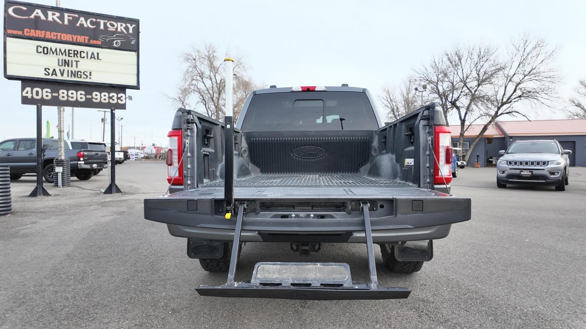 2021 Grey /Black Ford F-150 (1FTFW1E53MF) with an 5.0L V8 OHV 16V engine, 6A transmission, located at 4562 State Avenue, Billings, MT, 59101, (406) 896-9833, 45.769516, -108.526772 - This is a 2021 Ford F150 Lariat SuperCrew 4x4 with a 5 and a half foot bed This Ford runs and drives nicely, there are no accidents recorded on the history report. The Interior and exterior are clean, The 20 Inch Goodyear Wrangler Tires are in great shape it has a 5 Liter V8, 10 Speed automati - Photo#5