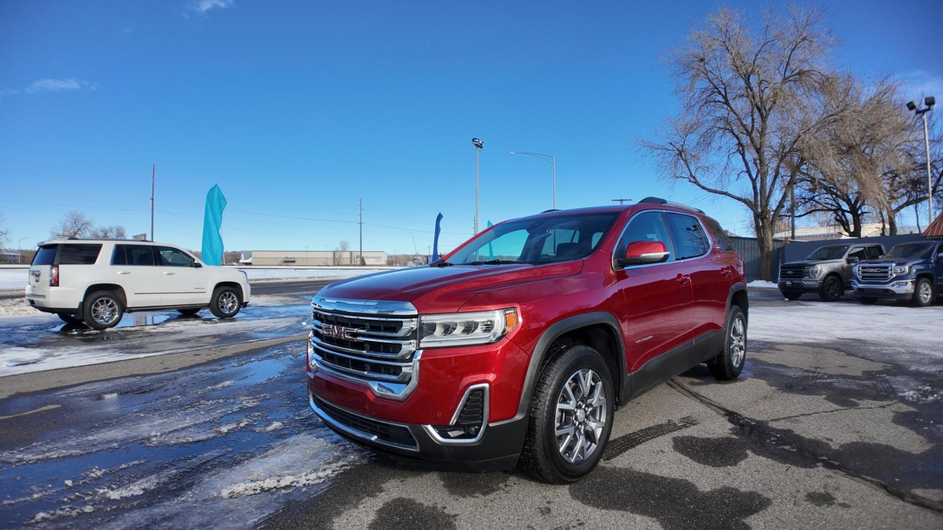 2023 Volcanic Red Tintcoat /Jet Black GMC Acadia SLT AWD (1GKKNUL4XPZ) with an 2.0L L4 DOHC 16V TURBO engine, 9A transmission, located at 4562 State Avenue, Billings, MT, 59101, (406) 896-9833, 45.769516, -108.526772 - 2023 GMC Acadia SLT All Wheel Drive The Acadia is a 1 Owner vehicle. There are no accidents recorded on the history report. The Interior and exterior are clean. The SUV also has the remainder of the factory warranty. The 18 Inch tires are in good shape. it has a 2 Liter Turbo Engine, 9 Speed a - Photo#2