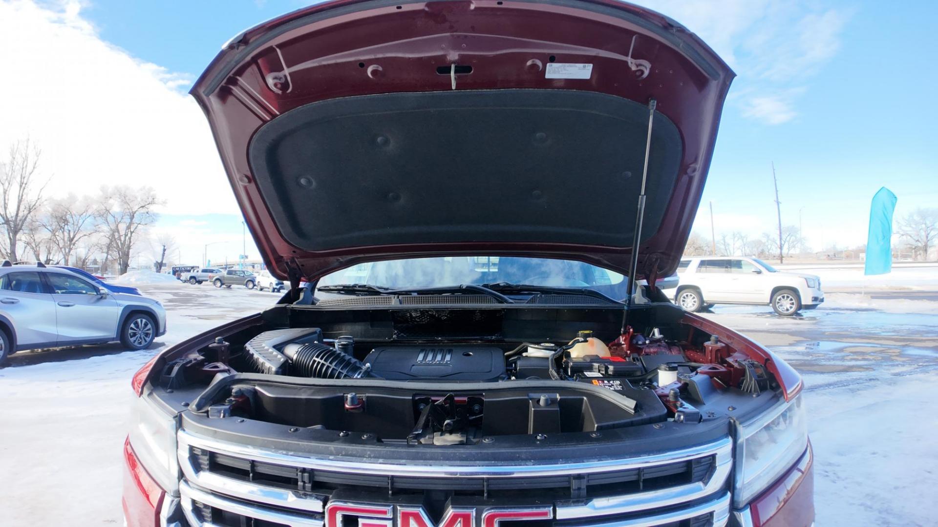 2023 Volcanic Red Tintcoat /Jet Black GMC Acadia SLT AWD (1GKKNUL4XPZ) with an 2.0L L4 DOHC 16V TURBO engine, 9A transmission, located at 4562 State Avenue, Billings, MT, 59101, (406) 896-9833, 45.769516, -108.526772 - 2023 GMC Acadia SLT All Wheel Drive The Acadia is a 1 Owner vehicle. There are no accidents recorded on the history report. The Interior and exterior are clean. The SUV also has the remainder of the factory warranty. The 18 Inch tires are in good shape. it has a 2 Liter Turbo Engine, 9 Speed a - Photo#13