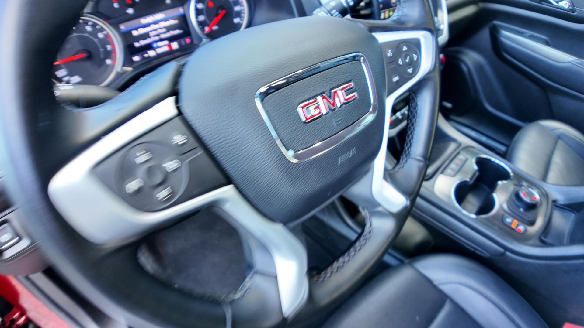 2023 Volcanic Red Tintcoat /Jet Black GMC Acadia SLT AWD (1GKKNUL4XPZ) with an 2.0L L4 DOHC 16V TURBO engine, 9A transmission, located at 4562 State Avenue, Billings, MT, 59101, (406) 896-9833, 45.769516, -108.526772 - 2023 GMC Acadia SLT All Wheel Drive The Acadia is a 1 Owner vehicle. There are no accidents recorded on the history report. The Interior and exterior are clean. The SUV also has the remainder of the factory warranty. The 18 Inch tires are in good shape. it has a 2 Liter Turbo Engine, 9 Speed a - Photo#20