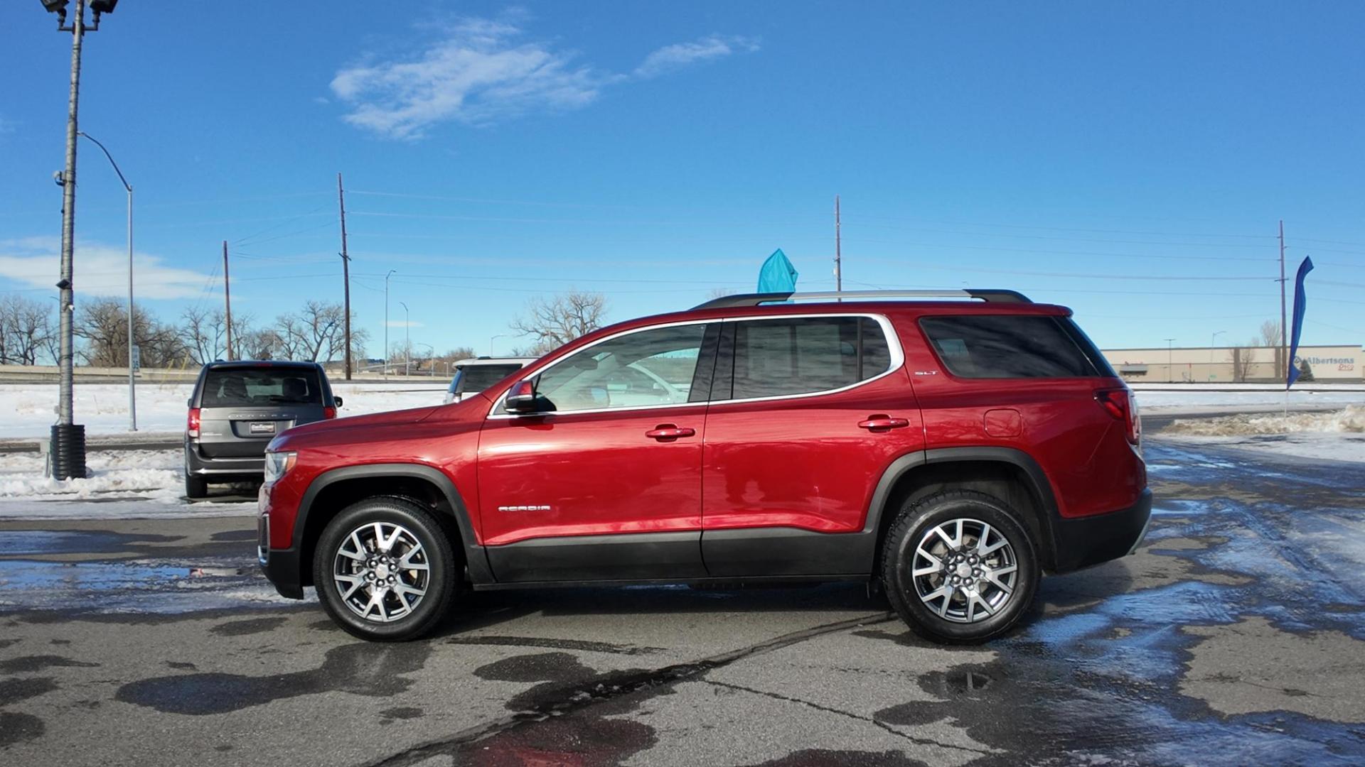 2023 Volcanic Red Tintcoat /Jet Black GMC Acadia SLT AWD (1GKKNUL4XPZ) with an 2.0L L4 DOHC 16V TURBO engine, 9A transmission, located at 4562 State Avenue, Billings, MT, 59101, (406) 896-9833, 45.769516, -108.526772 - 2023 GMC Acadia SLT All Wheel Drive The Acadia is a 1 Owner vehicle. There are no accidents recorded on the history report. The Interior and exterior are clean. The SUV also has the remainder of the factory warranty. The 18 Inch tires are in good shape. it has a 2 Liter Turbo Engine, 9 Speed a - Photo#3