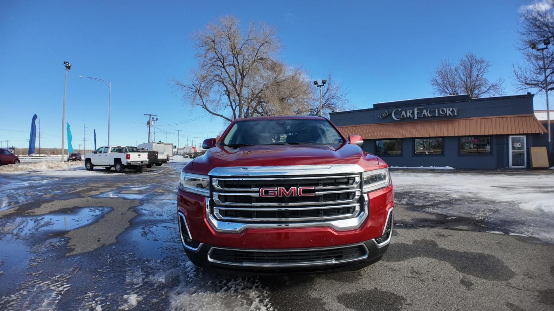 2023 Volcanic Red Tintcoat /Jet Black GMC Acadia SLT AWD (1GKKNUL4XPZ) with an 2.0L L4 DOHC 16V TURBO engine, 9A transmission, located at 4562 State Avenue, Billings, MT, 59101, (406) 896-9833, 45.769516, -108.526772 - 2023 GMC Acadia SLT All Wheel Drive The Acadia is a 1 Owner vehicle. There are no accidents recorded on the history report. The Interior and exterior are clean. The SUV also has the remainder of the factory warranty. The 18 Inch tires are in good shape. it has a 2 Liter Turbo Engine, 9 Speed a - Photo#4